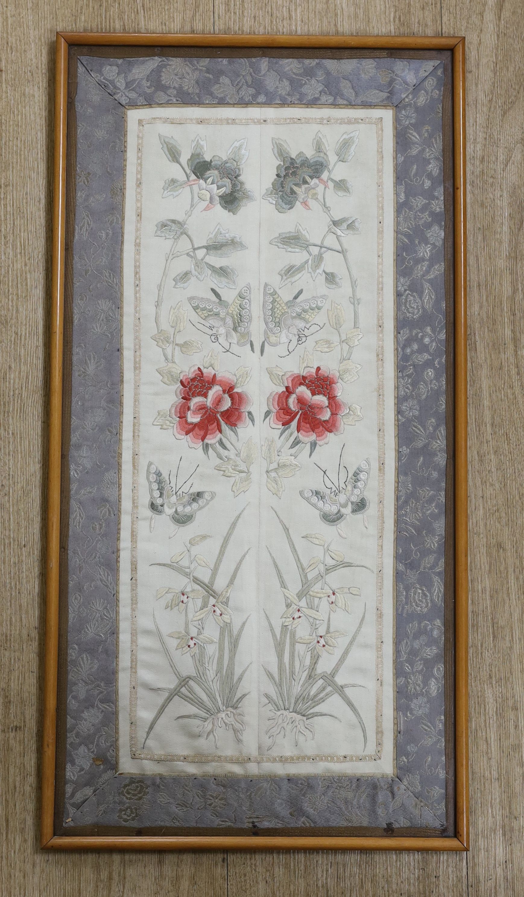 A pair of Chinese 19th century framed embroidered sleeve bands